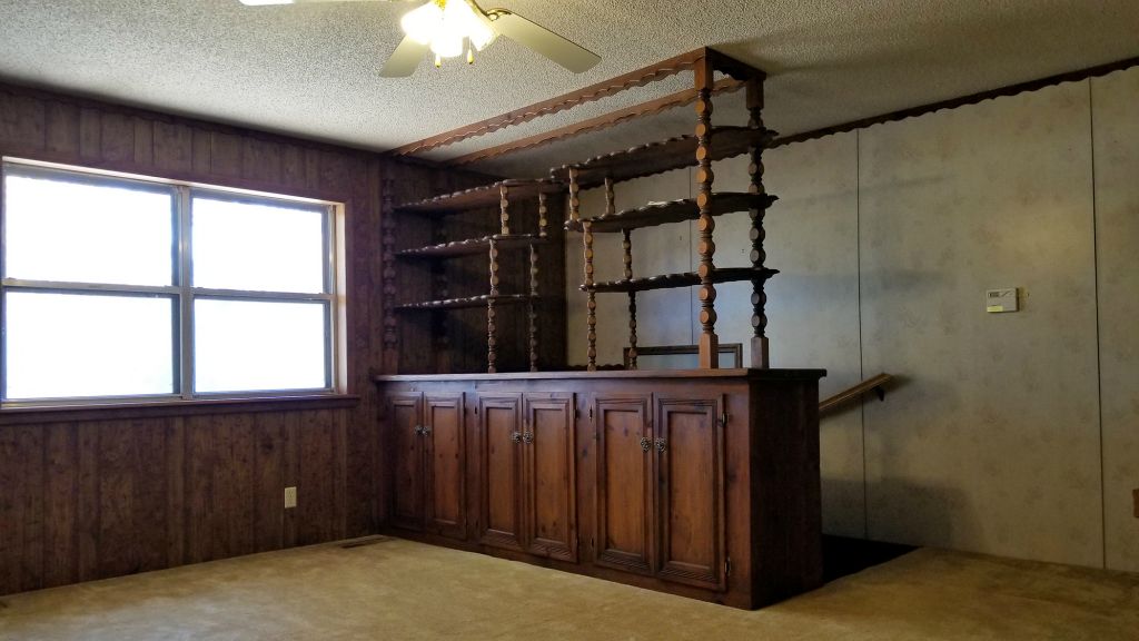 Custom built cabinetry and storage in Den